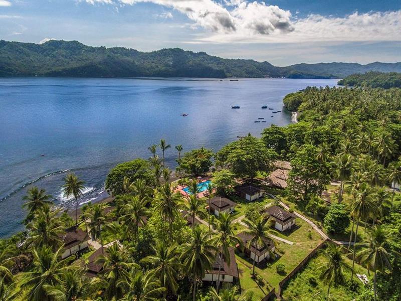 Dive into Lembeh at Hairball Resort - divers hotel. Aerial view.